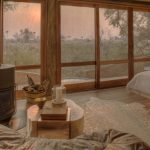 &Beyond Sandibe Okavango Safari Lodge Bedroom Fire